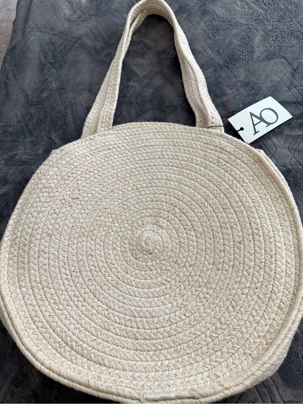 New!  Round eye ivory woven with gold thread tote bag